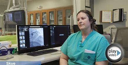 Cardiac Staff member at their desk working